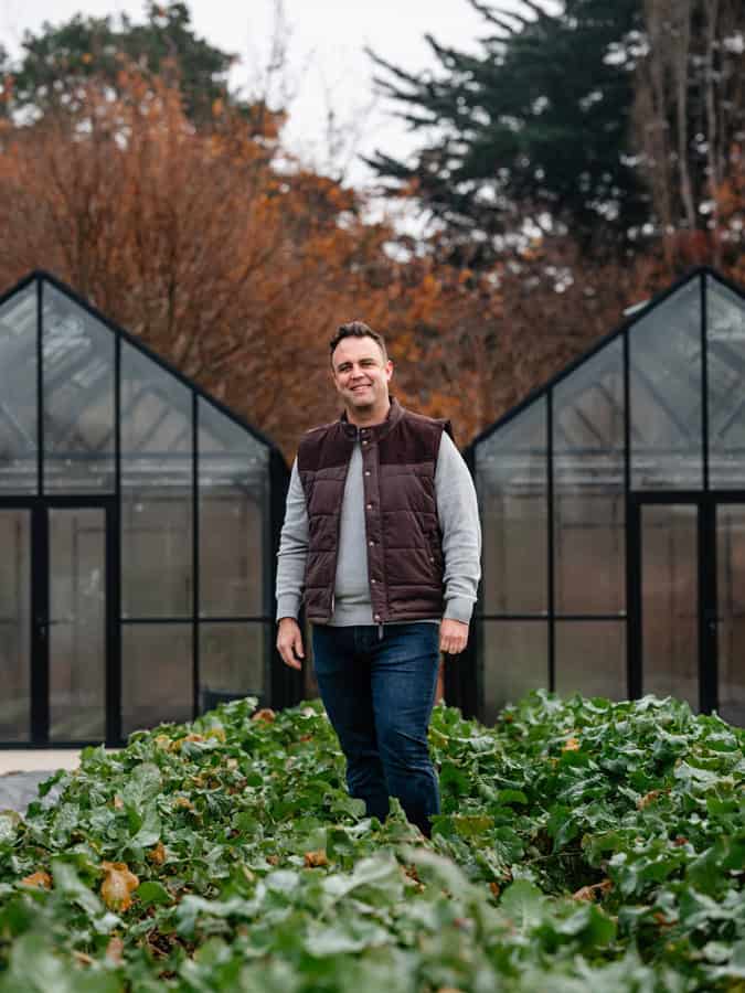 Florence Charvin Photography Craggy Range Cuisine magazine photo portrait of world class chef Casey McDonald in his vegetable garden on the Craggy Range property